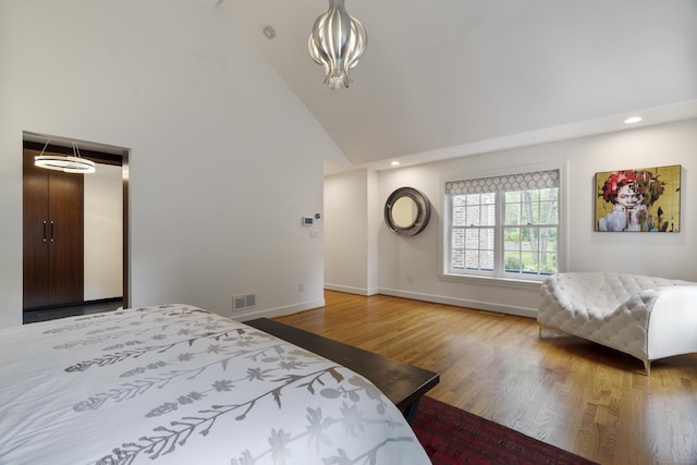 16 Whitehall Pl, Farmington, CT 06032 - bedroom with high vaulted ceiling, baseboards, wood finished floors, and recessed lighting