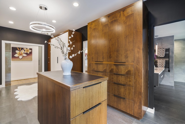 16 Whitehall Pl, Farmington, CT 06032 - kitchen featuring modern cabinets, recessed lighting, hanging light fixtures, baseboards, and a chandelier