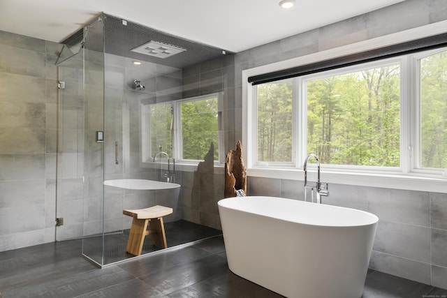 16 Whitehall Pl, Farmington, CT 06032 - bathroom featuring tile walls, plenty of natural light, a freestanding bath, and a stall shower