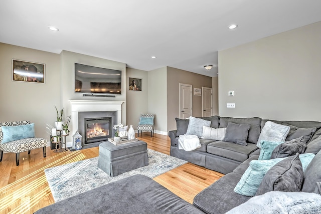 40 Newbury Ct Unit 40, North Haven, CT 06473 - living area with wood finished floors, a glass covered fireplace, and recessed lighting