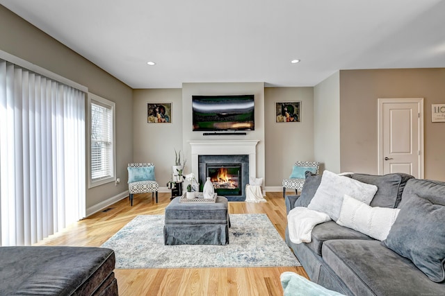 40 Newbury Ct Unit 40, North Haven, CT 06473 - living area featuring a fireplace with flush hearth, recessed lighting, and wood finished floors