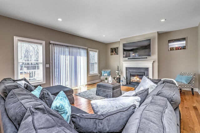 40 Newbury Ct Unit 40, North Haven, CT 06473 - living area featuring a fireplace with flush hearth, light wood-style floors, and recessed lighting