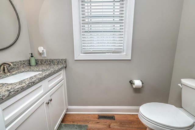 40 Newbury Ct Unit 40, North Haven, CT 06473 - half bath with vanity and wood finished floors