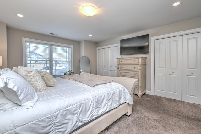 40 Newbury Ct Unit 40, North Haven, CT 06473 - carpeted bedroom featuring multiple closets and recessed lighting
