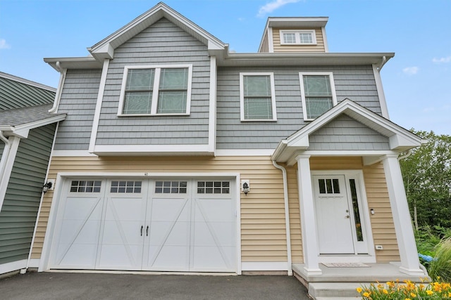 40 Newbury Ct Unit 40, North Haven, CT 06473 - view of front of home featuring driveway and a garage