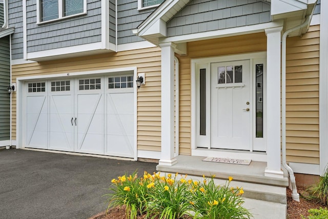 40 Newbury Ct Unit 40, North Haven, CT 06473 - entrance to property with a garage and driveway