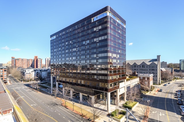 view of building exterior featuring a city view