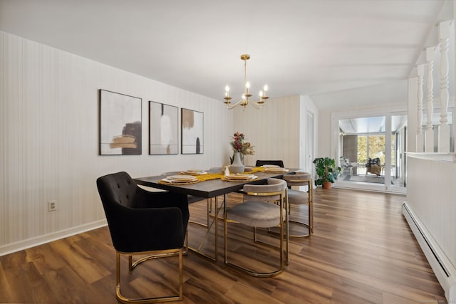 dining room with dark wood-style flooring, breakfast area, baseboard heating, a chandelier, and baseboards