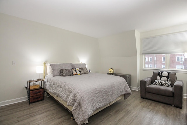 bedroom featuring dark hardwood / wood-style flooring