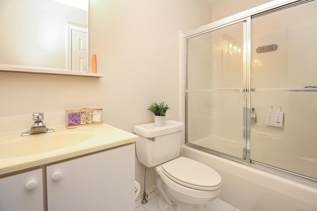 full bathroom featuring vanity, toilet, and enclosed tub / shower combo