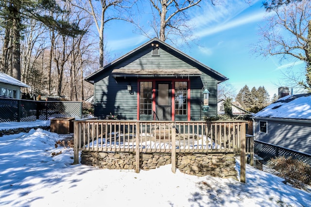 view of front of home with a wooden deck