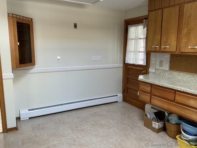 kitchen with a baseboard heating unit