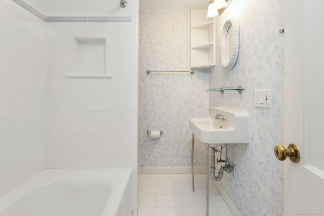 bathroom with tile patterned flooring, baseboards, and wallpapered walls