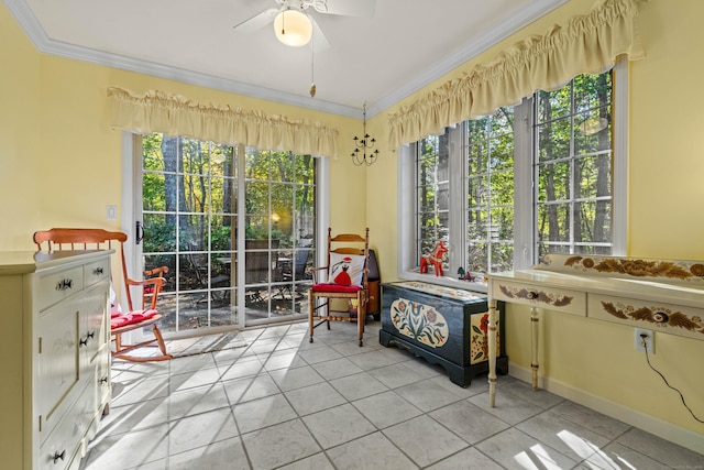 interior space with ceiling fan, ornamental molding, light tile patterned flooring, and a wealth of natural light