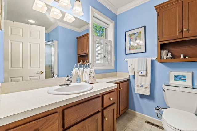 bathroom with toilet, an enclosed shower, crown molding, tile patterned floors, and vanity