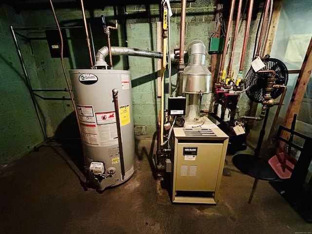 utility room featuring gas water heater