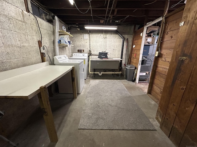 unfinished basement with separate washer and dryer