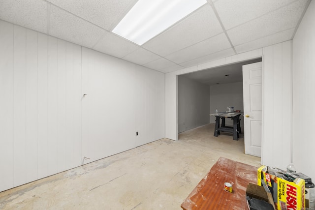 basement featuring a paneled ceiling