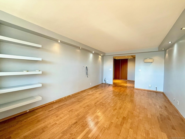 spare room with light wood-type flooring