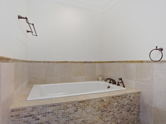 full bath featuring a garden tub and crown molding