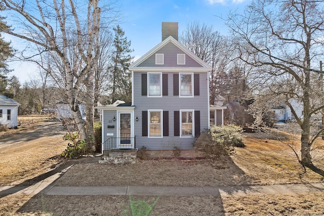 view of front of property with a chimney