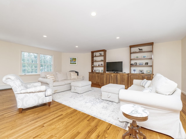 living room featuring recessed lighting and light wood-style floors