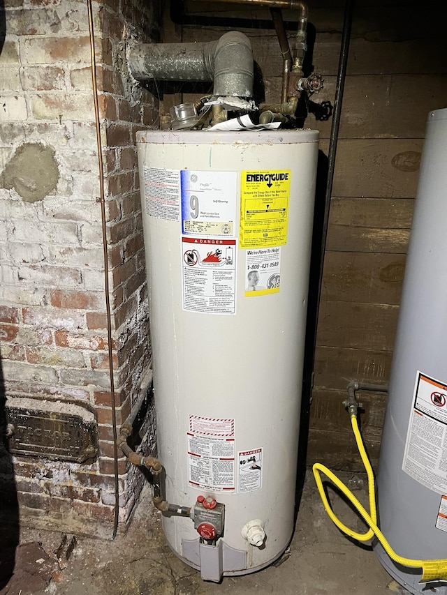 utility room with water heater