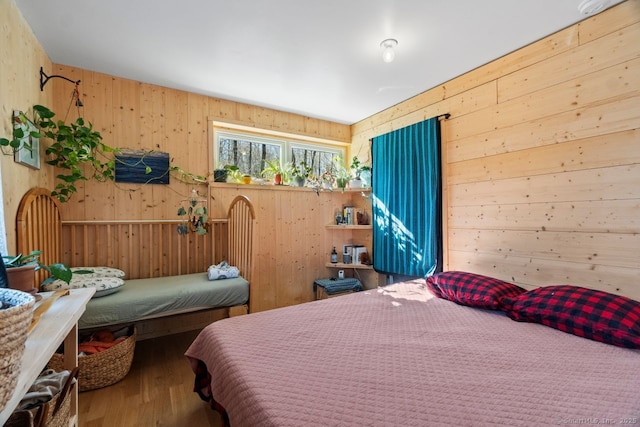 bedroom with wood finished floors