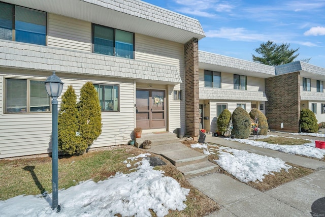 townhome / multi-family property with entry steps