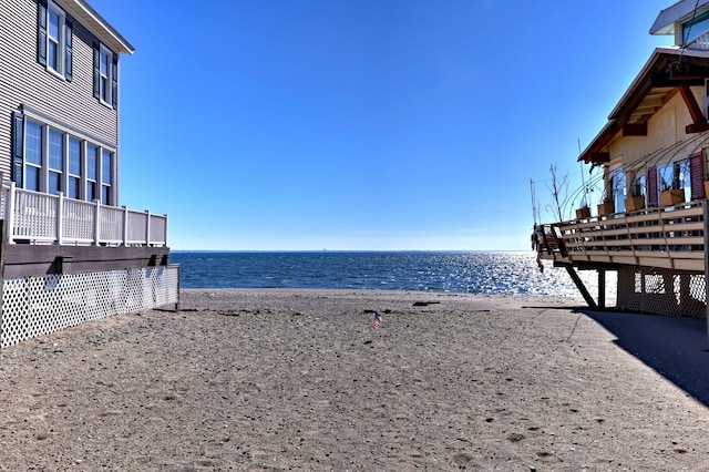 view of water feature with a beach view