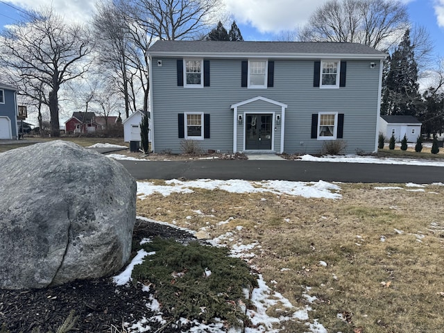 view of front of property featuring cooling unit