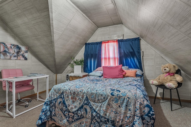 bedroom with carpet floors and lofted ceiling