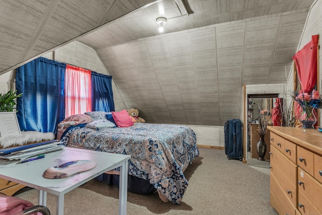 carpeted bedroom featuring lofted ceiling