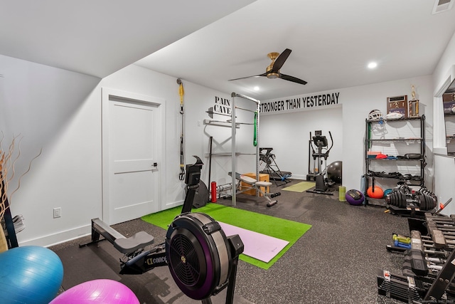 exercise room with visible vents, baseboards, and a ceiling fan