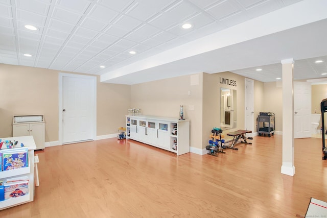 rec room with recessed lighting, light wood-style flooring, and baseboards