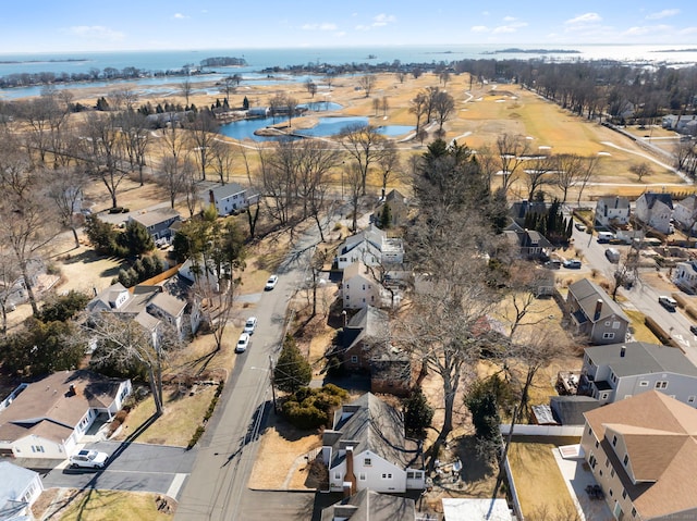 bird's eye view with a water view and a residential view