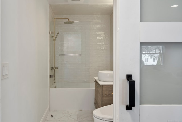 full bath with shower / tub combination, toilet, vanity, baseboards, and marble finish floor