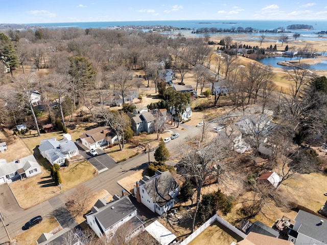 bird's eye view featuring a water view and a residential view