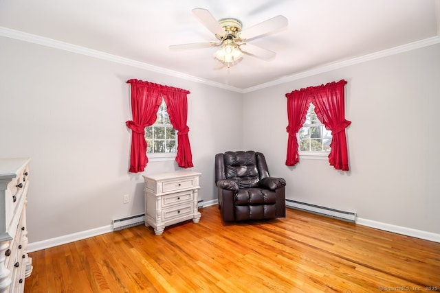 living area featuring a baseboard radiator, crown molding, and light wood-type flooring