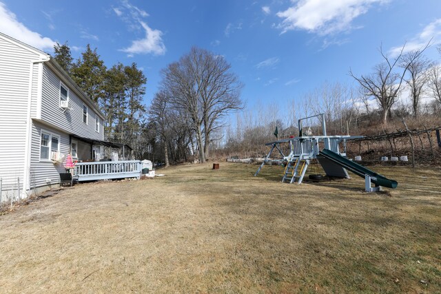 50 Dean Rd, New Milford, CT 06776 - view of green lawn with a playground and a wooden deck