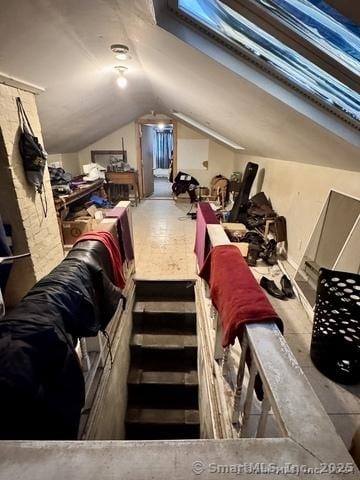 bonus room featuring lofted ceiling