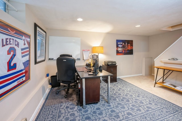 office with dark colored carpet, recessed lighting, and baseboards