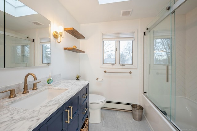 bathroom with a skylight, visible vents, a baseboard heating unit, enclosed tub / shower combo, and a healthy amount of sunlight