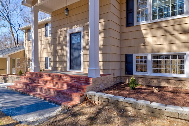 doorway to property with a porch