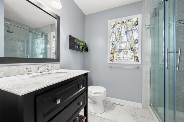 full bath featuring toilet, vanity, visible vents, baseboards, and marble finish floor