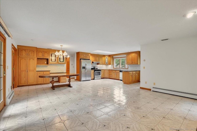 101 Langford Ln, East Hartford, CT 06118 - kitchen featuring stainless steel appliances, baseboard heating, a chandelier, decorative backsplash, and baseboards