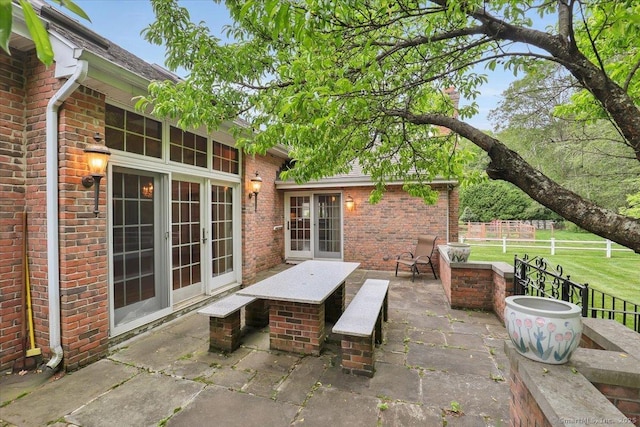 101 Langford Ln, East Hartford, CT 06118 - view of patio with french doors