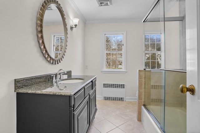 bathroom with tile patterned flooring, radiator heating unit, enclosed tub / shower combo, ornamental molding, and vanity