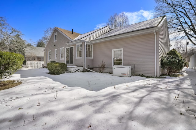 view of snow covered property