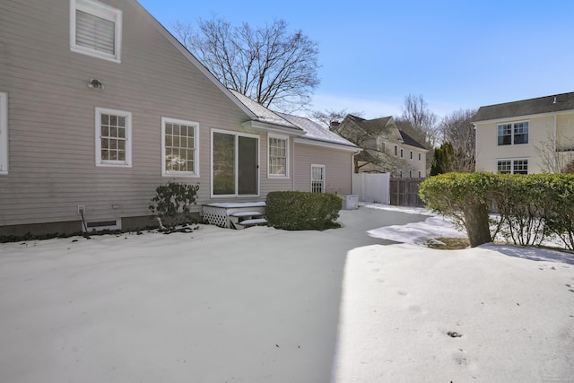 view of snow covered house